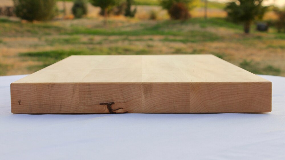 https://www.woodcuttingboardstore.com/wp-content/uploads/2020/06/14x20-Maple-Wood-Cutting-Board-wFREE-Board-Butter3.jpg